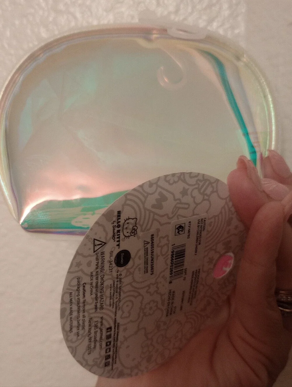 Hello Kitty Iridescent Holographic Cosmetic Pouch with Pink Bow Zipper  Accent